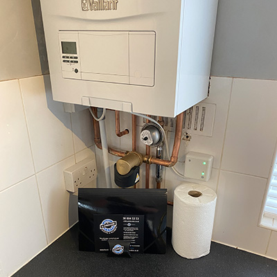Heating Services Croydon New heating system we installed for a client in their kitchen with our branded welcome pack.